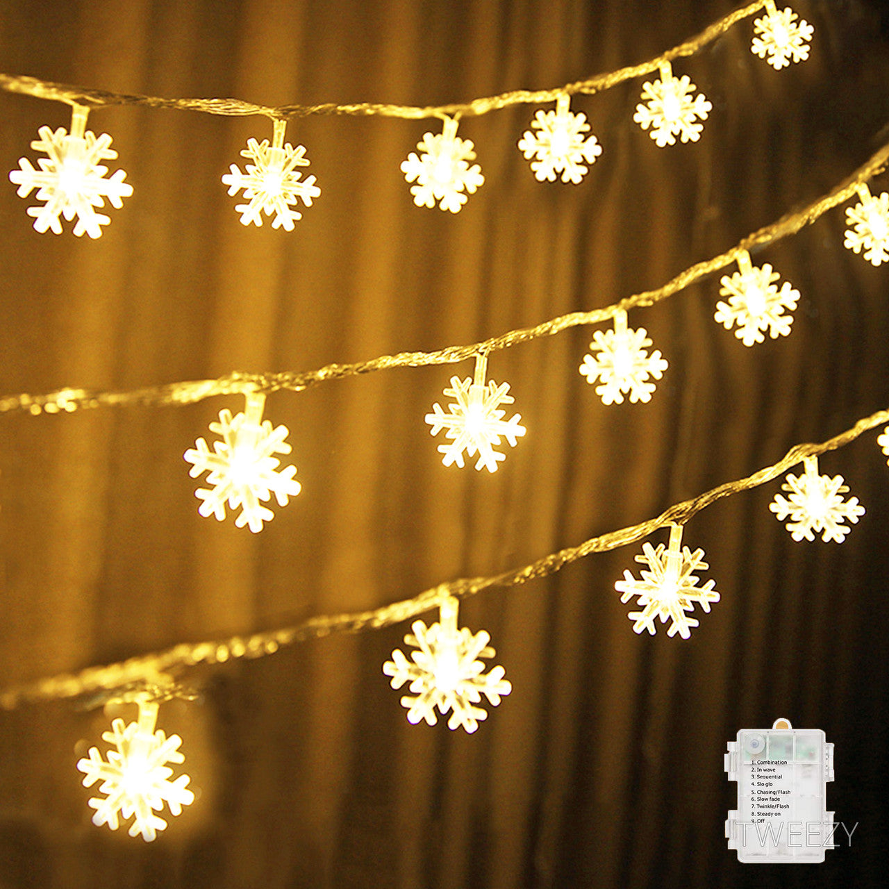 Світлодіодна гірлянда зі сніжинок на батарейках на 40 лампочок 5м (теплий білий)